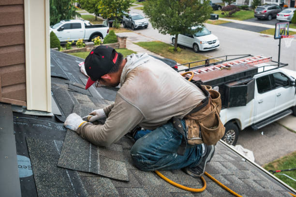 Professional Gutter Repair And Installation technician working in Port Reading, NJ